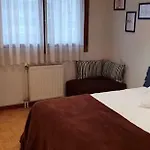 Visitar *